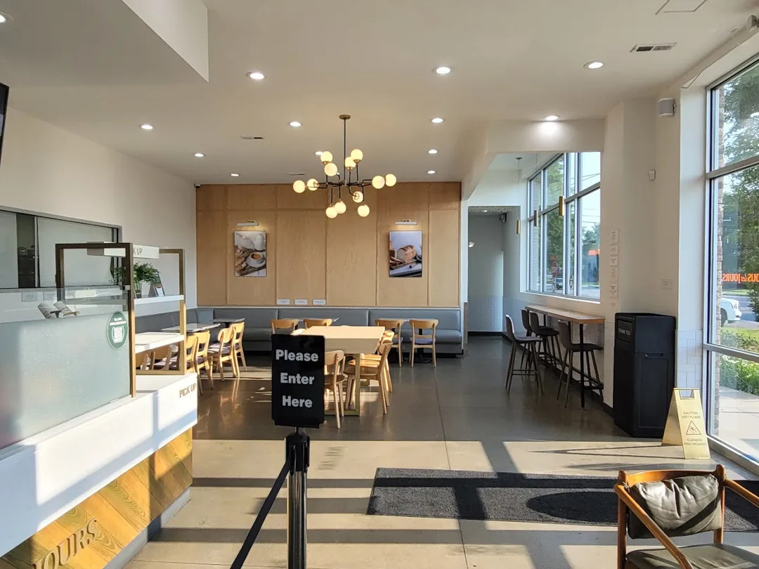Seating area inside TOUS les JOURS Troy